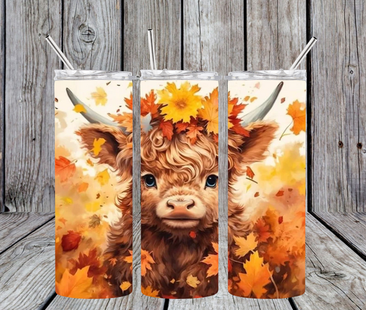 Fall leaves highland cow