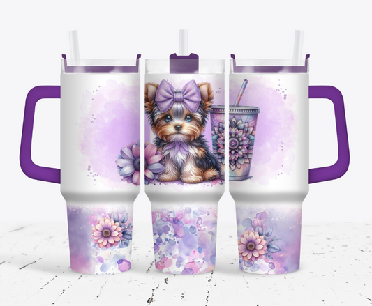 Yorkie puppy with purple flowers