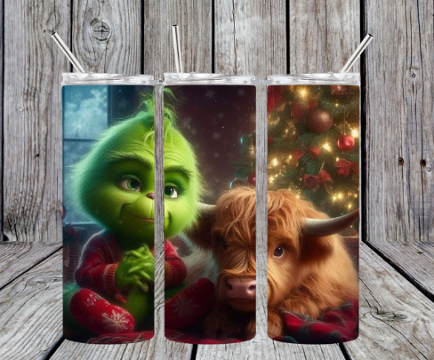 Baby grinch with highland cow baby