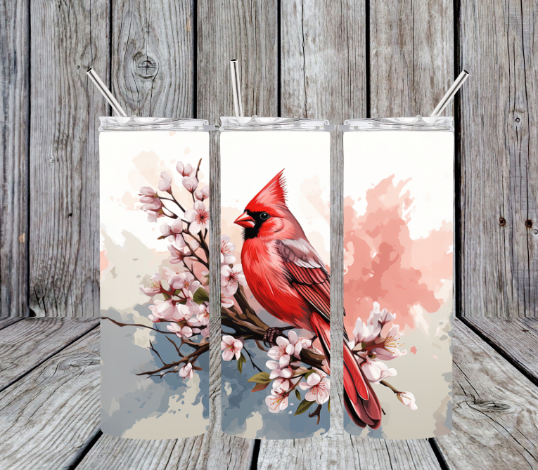 Red Bird on tree branch with flowers