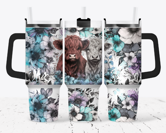 Brown and white highland with black and blue flowers